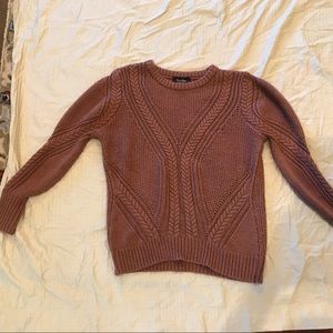 Pink knitted sweater